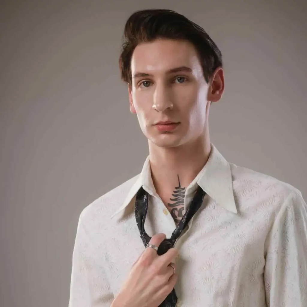 A man in a white shirt is tying a tie, showcasing haircuts for men with diamond face.