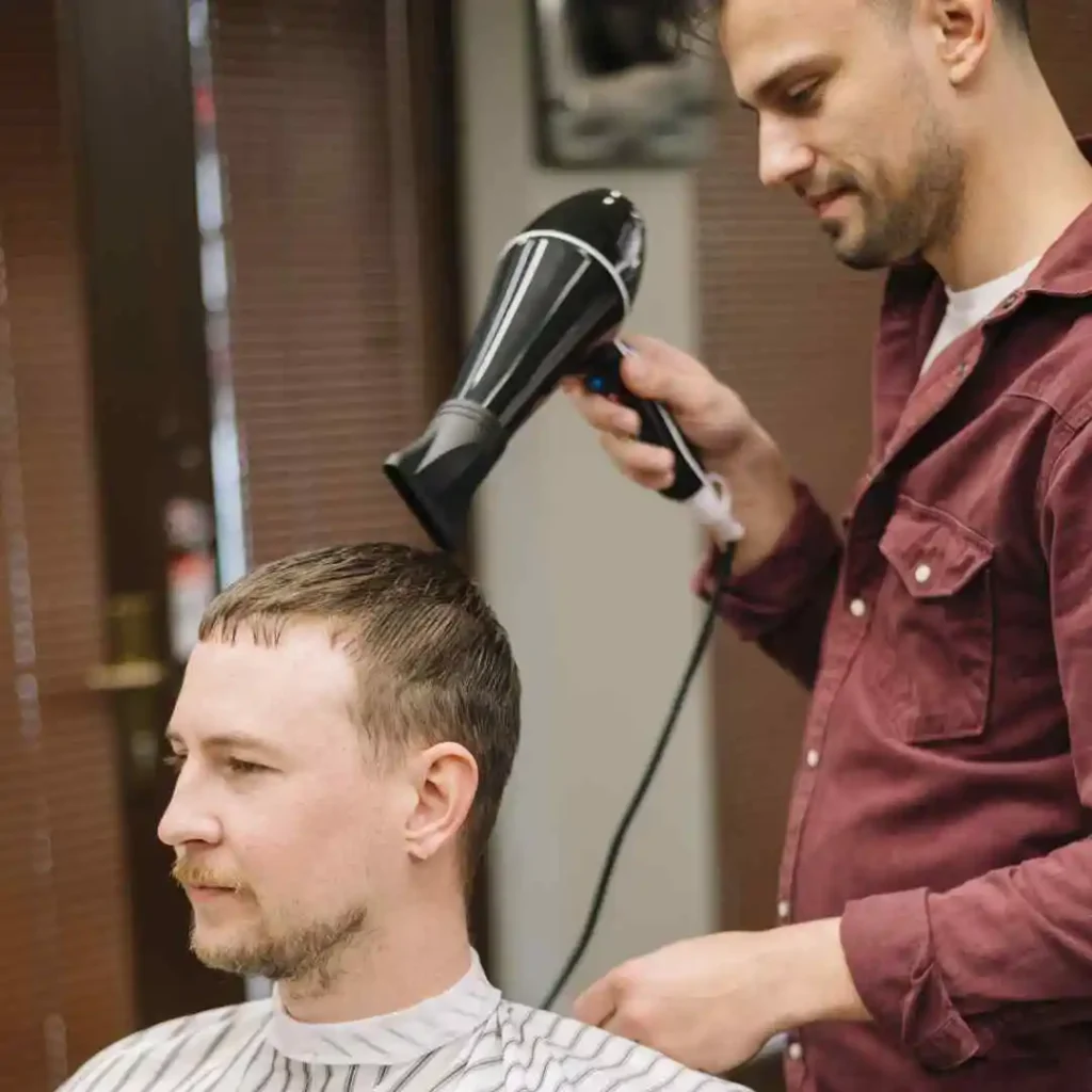 a man getting his hair cut