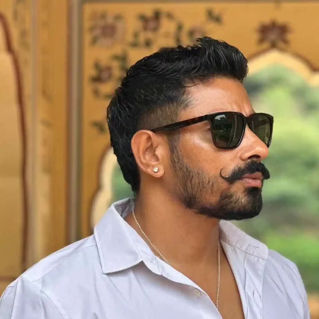 a man with a beard and sunglasses