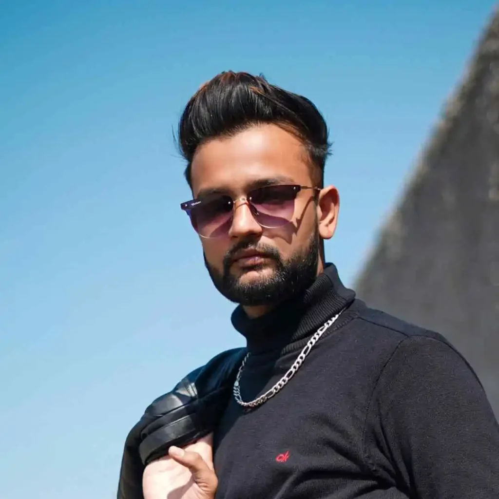 52 Mid-Length Hairstyles for Men- A Comprehensive Guide. 8 a man wearing sunglasses