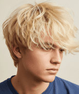 A young man with fluffy blonde hair
