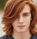 Eye-Catching Mens Red Hair Hairstyles 7 A young man with vibrant red Long Layered Hair, dressed in a black shirt