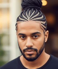 A man sporting a bun hairstyle, featuring cornrows as a stylish protective option for men.